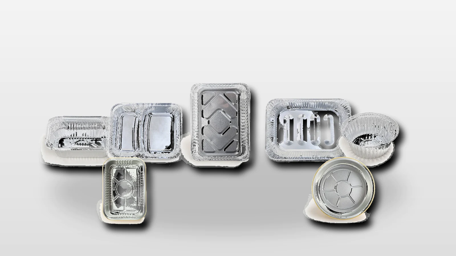 Assorted aluminum foil containers and matching lids arranged for foodservice distributor product selection